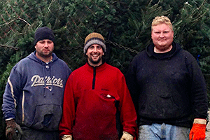 Uncle Steve with Chris and Jesse, the Christmas tree farmers who keep our Christmas trees beautiful, our customers happy, and Uncle Steve smiling